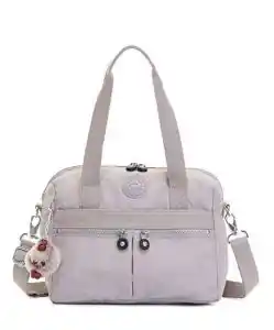 Light gray satchel bag with two top handles and a detachable shoulder strap. The front has multiple zippered pockets and a small plush monkey charm hanging from one side.